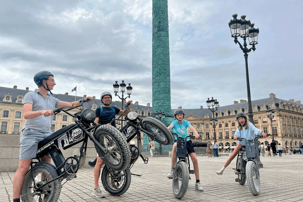 A family enjoying a Guided Electric Bike Tour on a Paris Bike Tours for Families